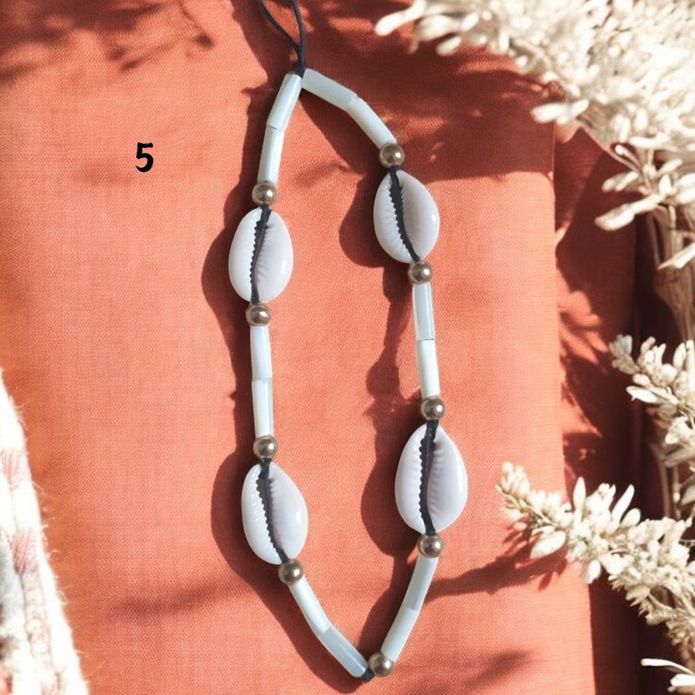 Bijoux de Portable Cauris : L'Accessoire Tendance Qui a du Sens